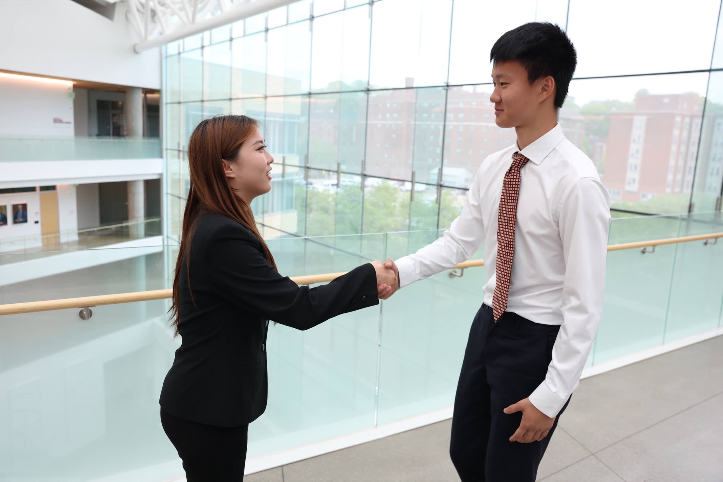 Two Scottie Ventures members shaking hands